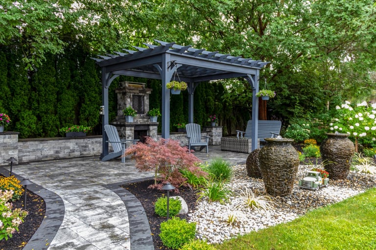 Professional landscaping with stone features and lush greenery