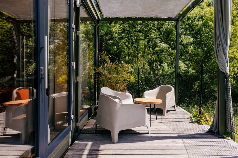 Modern house with garden and outdoor seating area